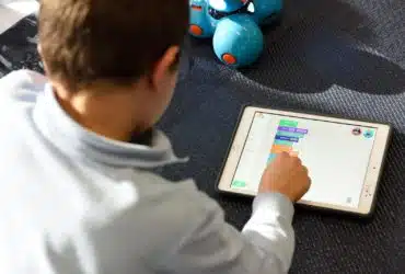 man using silver iPad